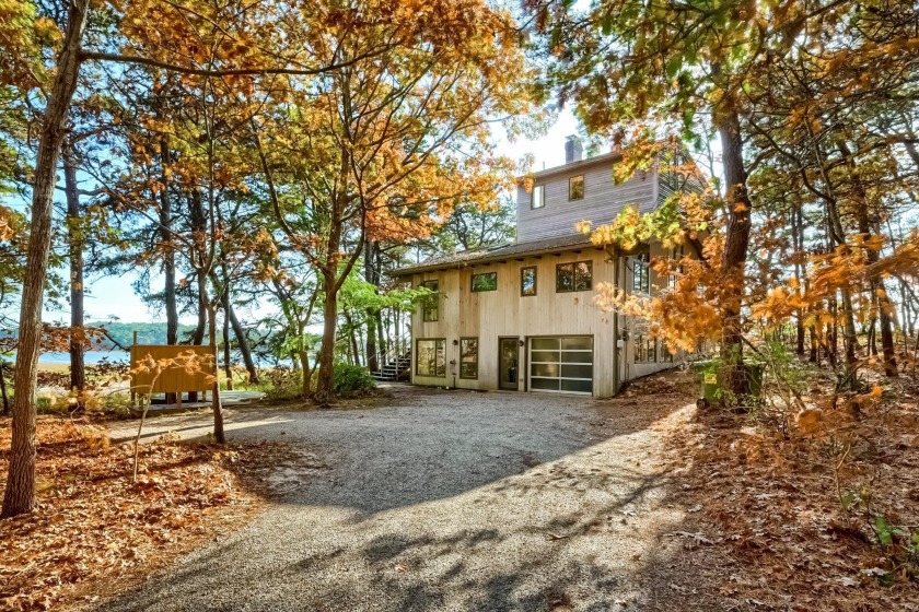 This contemporary waterfront is a jewel.  Tucked off a dirt road - Beach Home for sale in Wellfleet, Massachusetts on Beachhouse.com