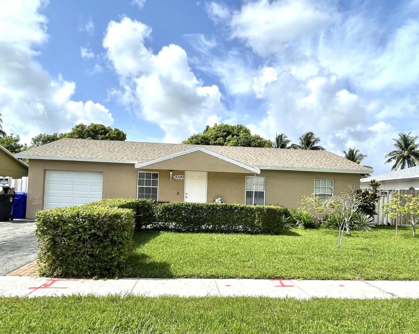 Beautiful well kept home with a new roof, upgraded kitchen with - Beach Home for sale in North Lauderdale, Florida on Beachhouse.com
