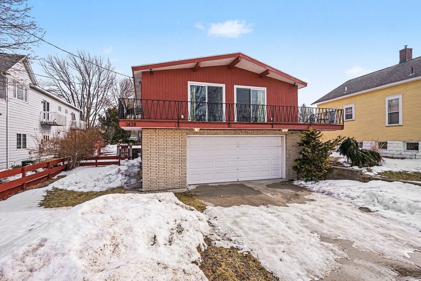 A truly rare find at Pere Marquette beach, this lovingly - Beach Home for sale in Muskegon, Michigan on Beachhouse.com