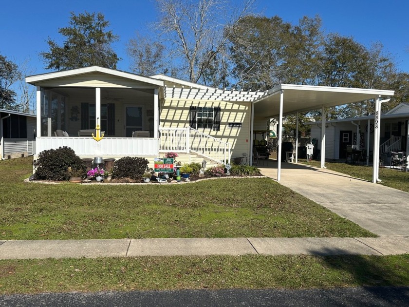 Step into this charming and adorable 3-bedroom, 2-bathroom home - Beach Home for sale in Foley, Alabama on Beachhouse.com