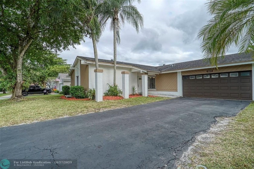 Nestled in the heart of Cooper City, this 3-BR 2 1/2 home offers - Beach Home for sale in Cooper City, Florida on Beachhouse.com