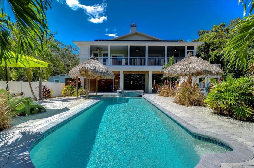 Experience upscale Coastal living in this elevated home...where - Beach Home for sale in Palm Harbor, Florida on Beachhouse.com