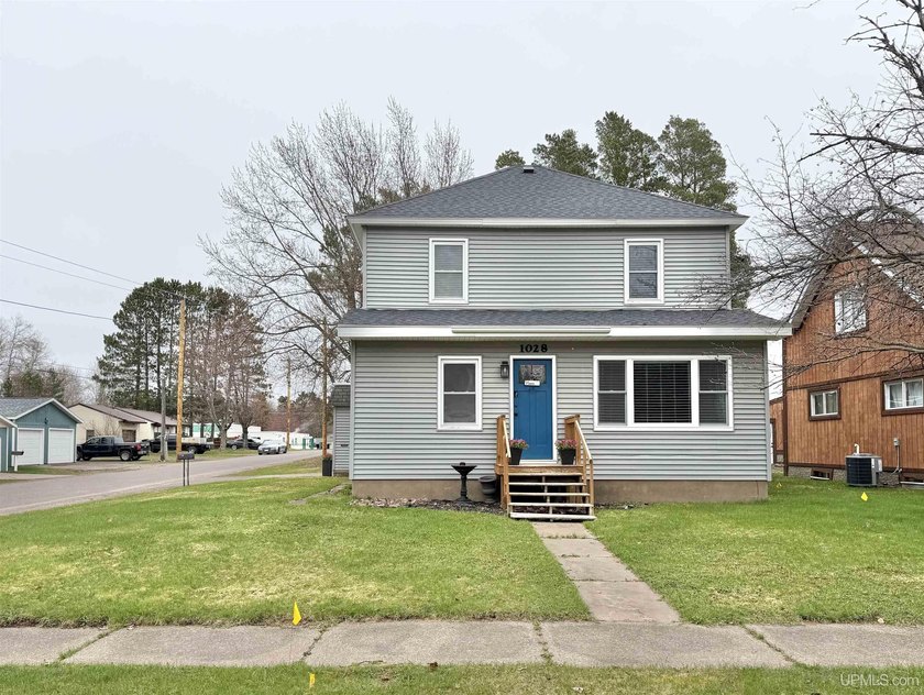 Move right into this modern, fully remodeled 4-bedroom, 2 full - Beach Home for sale in Ironwood, Michigan on Beachhouse.com
