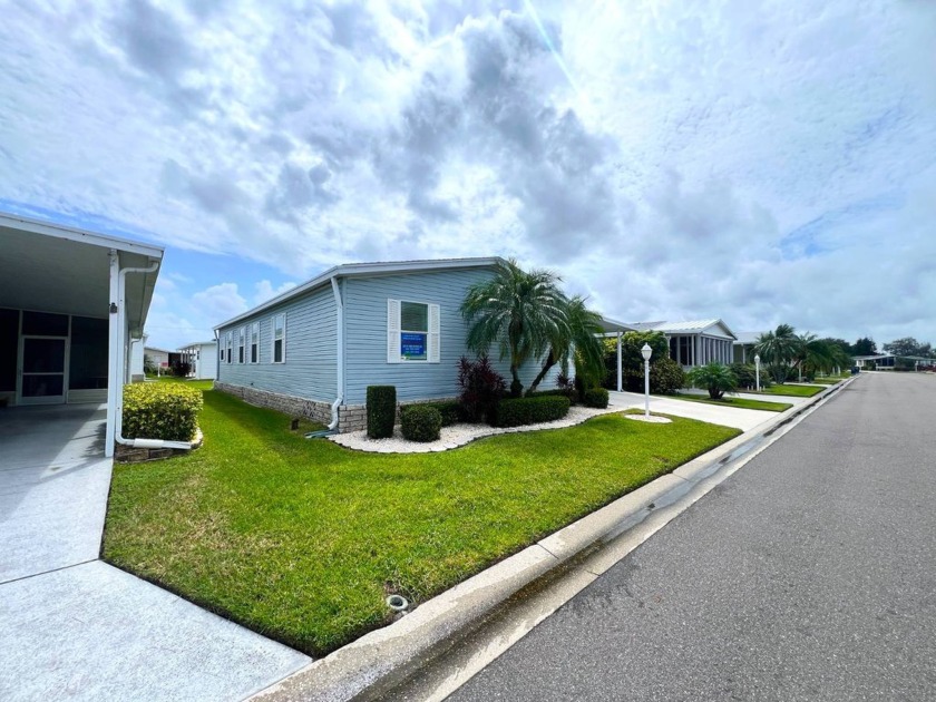 This charming 3-bedroom, 2-bath 1,300+ Sq Ft mobile home with - Beach Home for sale in Palmetto, Florida on Beachhouse.com