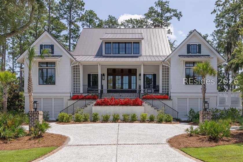 Set along the sweeping marshes overlooking Cauley's Creek and - Beach Home for sale in Bluffton, South Carolina on Beachhouse.com