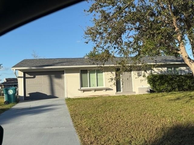 This inviting 3-bedroom, 2-bathroom home on .32 acres, in Port - Beach Home for sale in Port Charlotte, Florida on Beachhouse.com