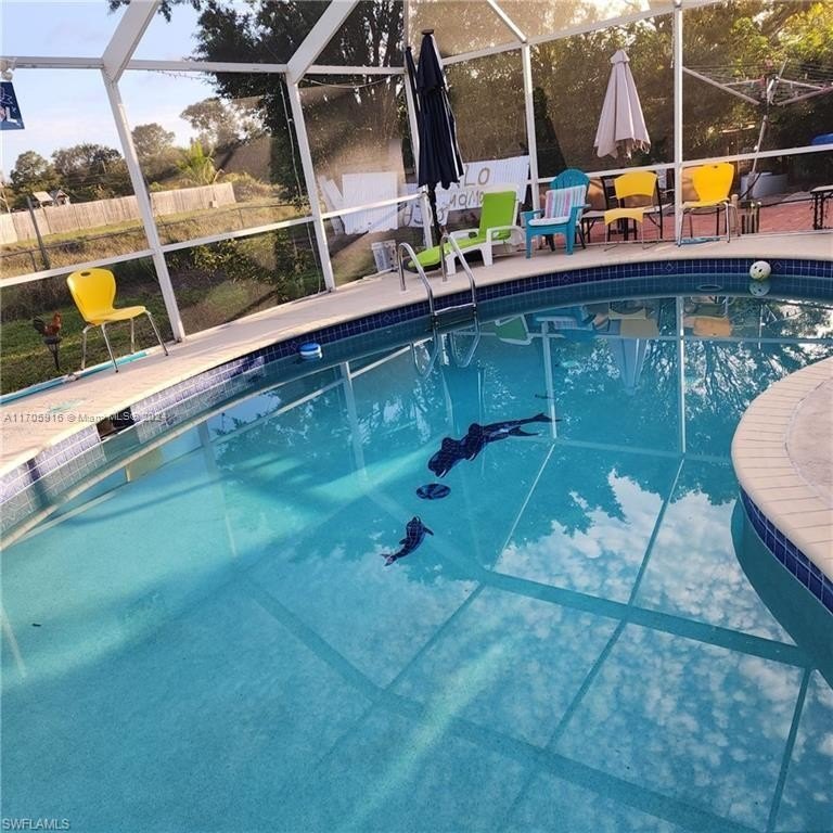 House with pool 0.5 of an acre and freshwater canal for 3 - Beach Home for sale in Lehigh Acres, Florida on Beachhouse.com