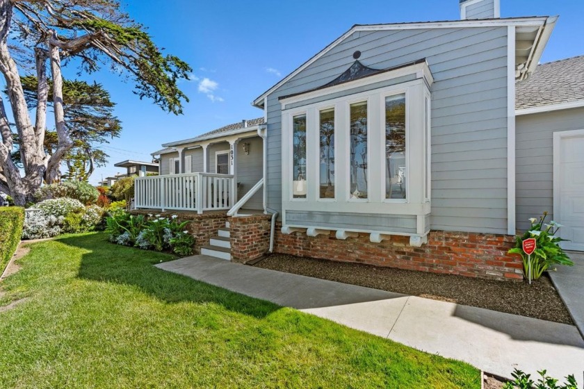 Perched on an elevated corner lot just two blocks from the - Beach Home for sale in Pacific Grove, California on Beachhouse.com