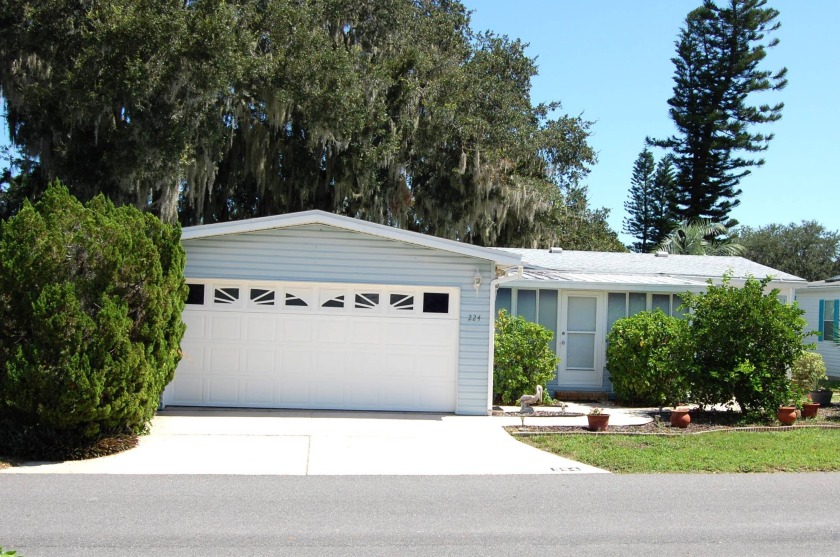 Located on the central long lake and just steps away from the - Beach Home for sale in Edgewater, Florida on Beachhouse.com