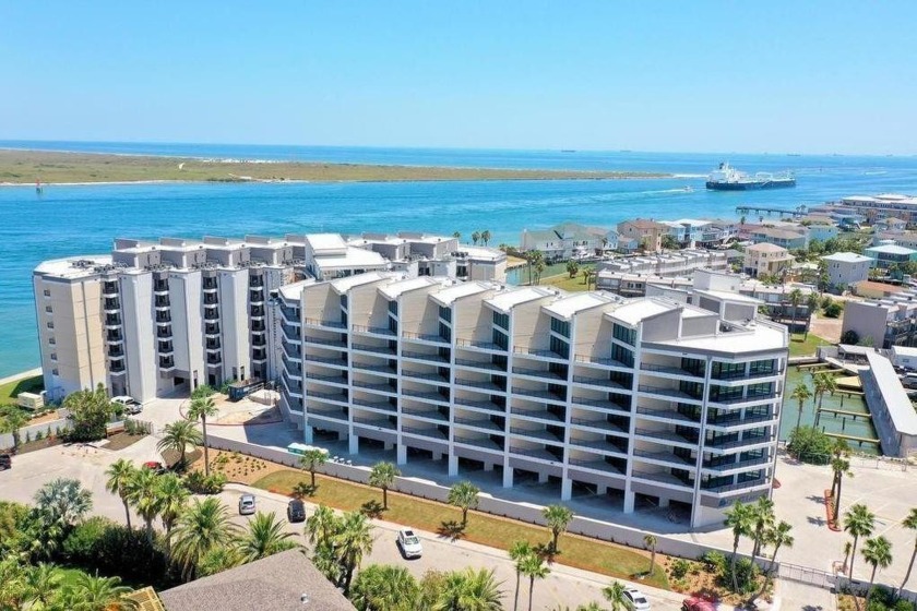 Dramatic sunsets and idyllic views of palm trees, the marina and - Beach Condo for sale in Port Aransas, Texas on Beachhouse.com
