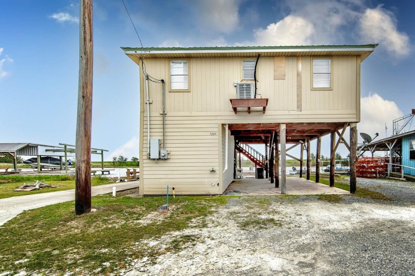 Experience the ultimate waterfront lifestyle with this charming - Beach Home for sale in Chauvin, Louisiana on Beachhouse.com