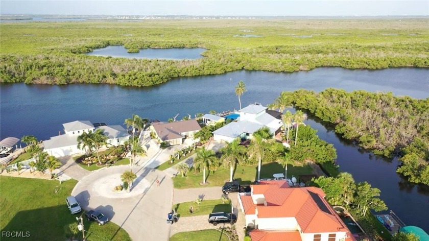 Experience coastal living at its finest with this exceptional - Beach Home for sale in Bokeelia, Florida on Beachhouse.com