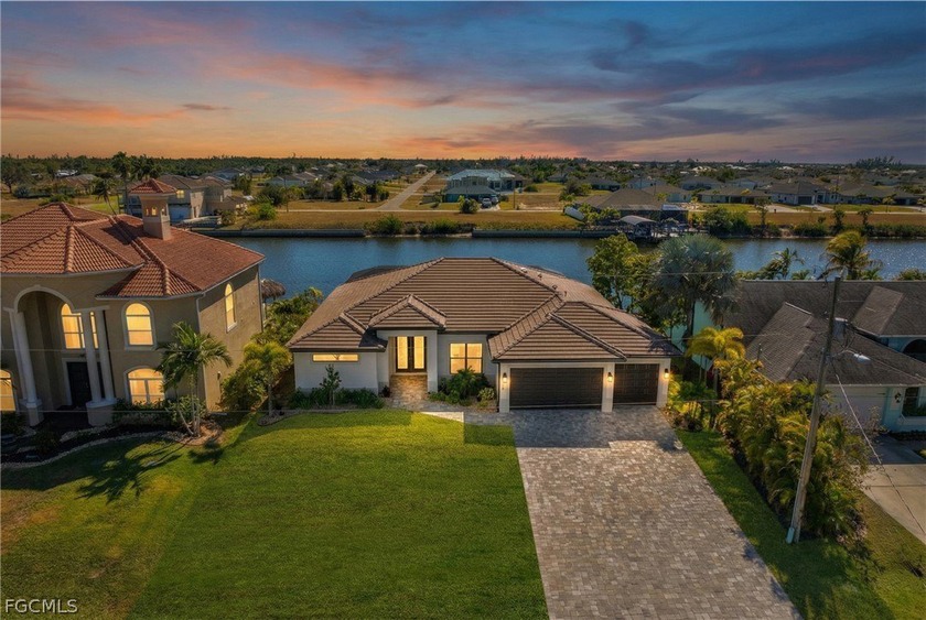 Welcome to 4114 NW 33rd Lane-a coastal retreat showcasing a tile - Beach Home for sale in Cape Coral, Florida on Beachhouse.com