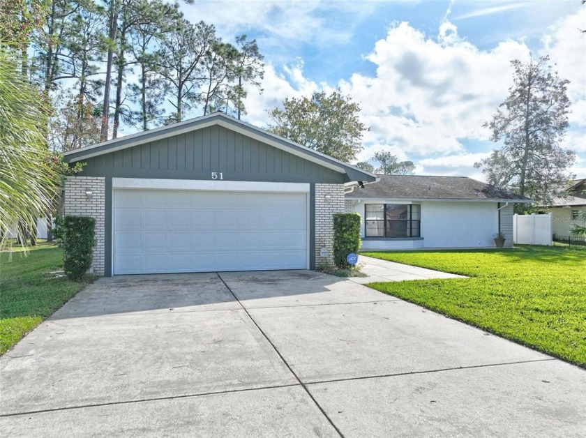 Welcome to 51 Westfield, ideally situated in the Pine Lakes golf - Beach Home for sale in Palm Coast, Florida on Beachhouse.com