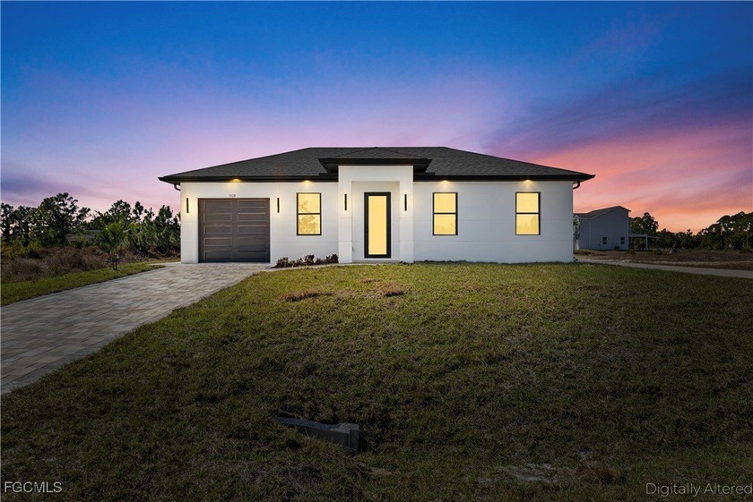 Welcome home to a brand new construction that blends modern - Beach Home for sale in Lehigh Acres, Florida on Beachhouse.com