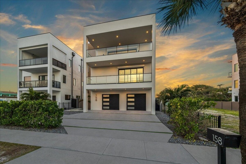 Step into the epitome of modern coastal living w this stunning - Beach Home for sale in Cocoa Beach, Florida on Beachhouse.com