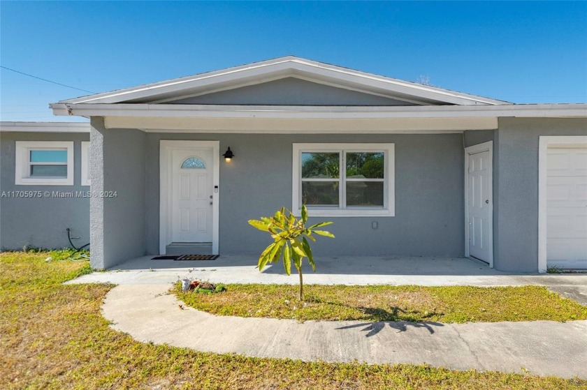 Welcome to this beautifully remodeled 4-bedroom, 2-bathroom home - Beach Home for sale in Merritt Island, Florida on Beachhouse.com