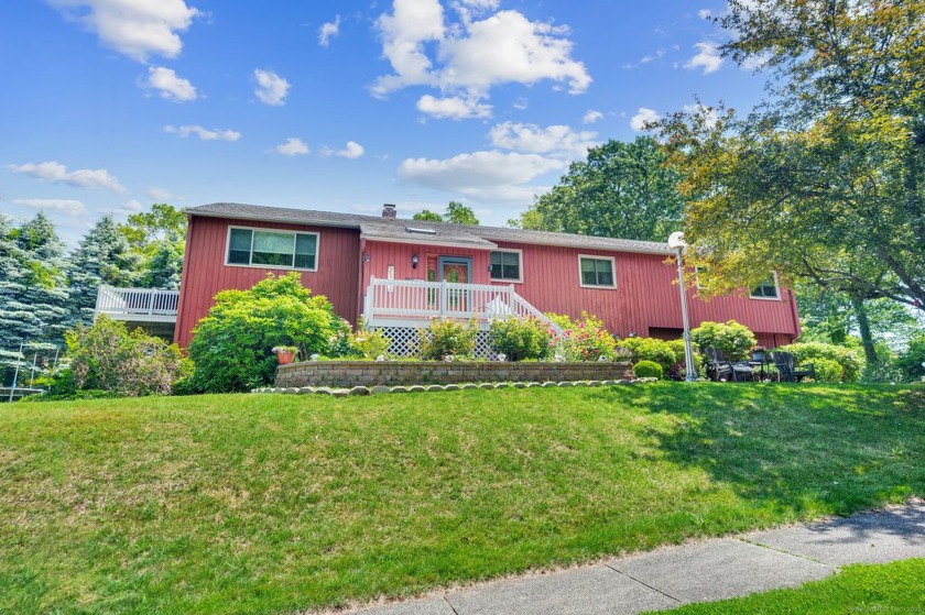 Set on a generous half-acre corner lot, this 3,400 sq ft home - Beach Home for sale in East Haven, Connecticut on Beachhouse.com