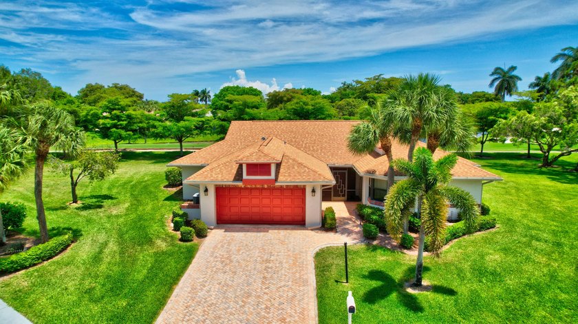 Come Live the 55+ Country Club Lifestyle in this Lake & Golf - Beach Home for sale in Delray Beach, Florida on Beachhouse.com
