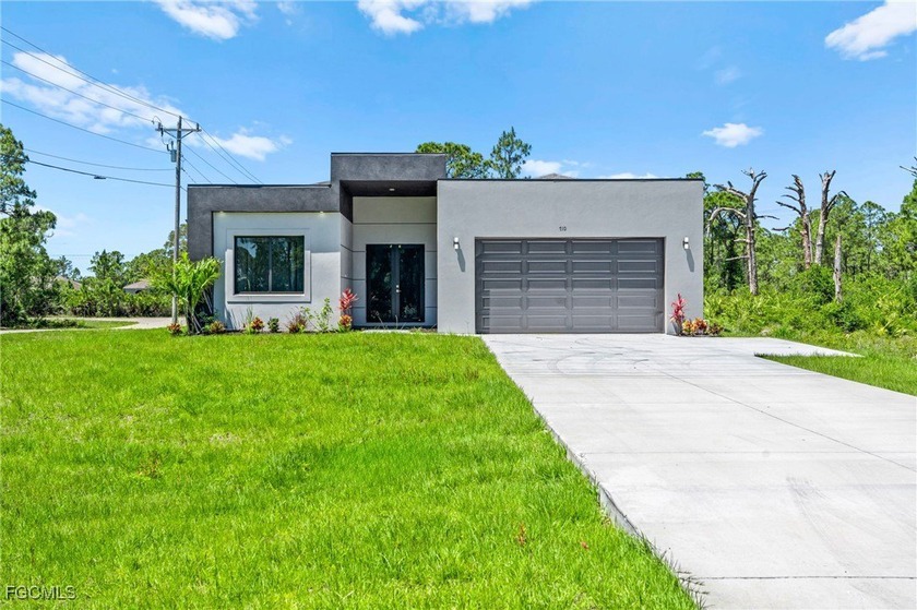Discover this stunning, move-in-ready new construction home - Beach Home for sale in Lehigh Acres, Florida on Beachhouse.com