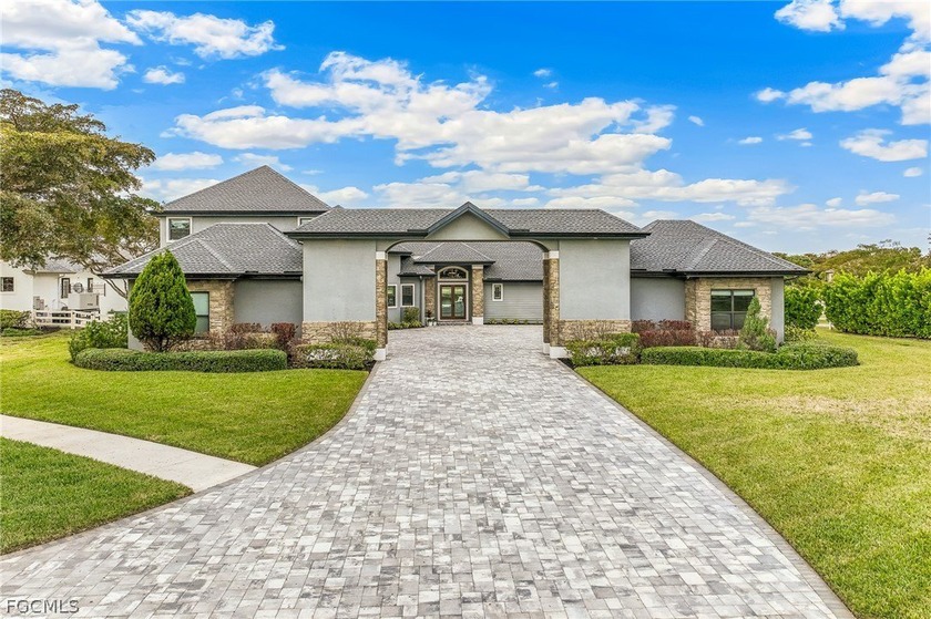 Welcome to this exceptional 2018-built lakefront residence - Beach Home for sale in Fort Myers, Florida on Beachhouse.com