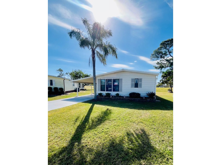 Nestled in Lake Fairways Country Club, this beautifully - Beach Home for sale in North Fort Myers, Florida on Beachhouse.com