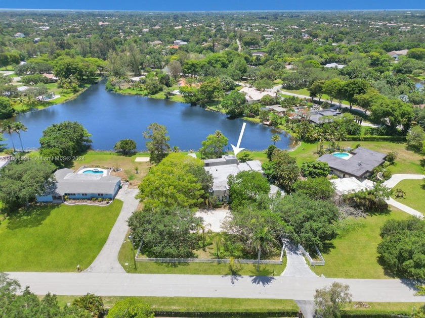 WELCOME TO THIS EXQUISITE 5-BED, 4-BATH COUNTRY ESTATE BY A - Beach Home for sale in Davie, Florida on Beachhouse.com