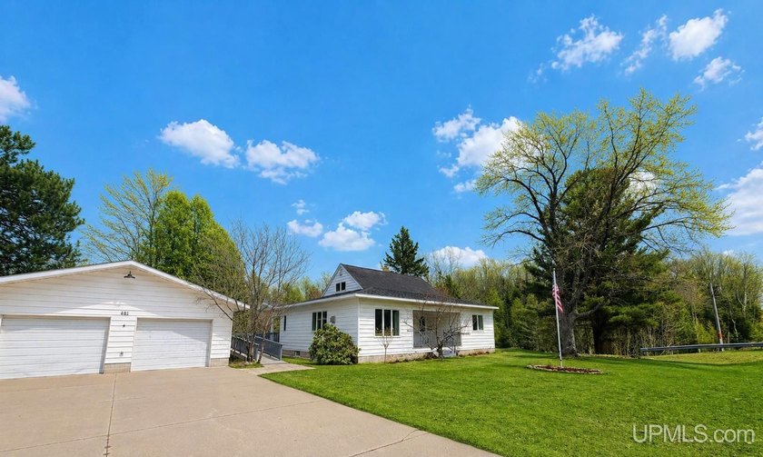 Beautifully updated and truly impressive, this home has - Beach Home for sale in Marquette, Michigan on Beachhouse.com
