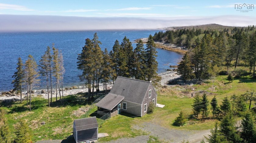 Architecturally designed 2 bedroom chalet featuring stunning - Beach Home for sale in Port Medway, Nova Scotia on Beachhouse.com
