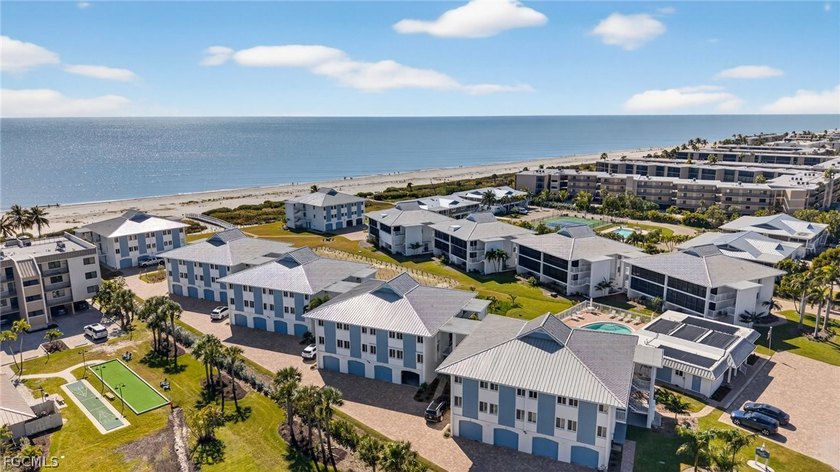 This impeccably remodeled two-bedroom, two bath residence offers - Beach Condo for sale in Sanibel, Florida on Beachhouse.com