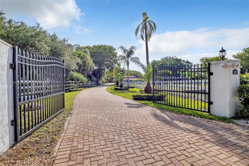 Exquisite Tropical Paradise situated on 2.5 acres with lake in - Beach Home for sale in Miramar, Florida on Beachhouse.com