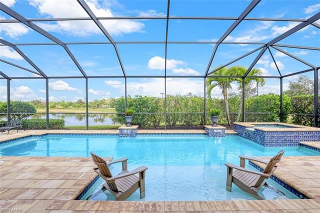 Experience Resort Style Living with a Lakefront gated community - Beach Home for sale in Naples, Florida on Beachhouse.com