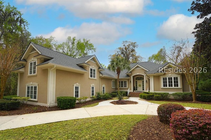 Tucked along the 5th hole of Belfair's West Course, this - Beach Home for sale in Bluffton, South Carolina on Beachhouse.com