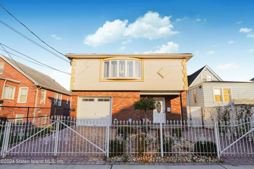 WELCOME TO THIS BEAUTIFULLY REMODELED TWO-FAMILY DETACHED HOME - Beach Home for sale in Staten Island, New York on Beachhouse.com