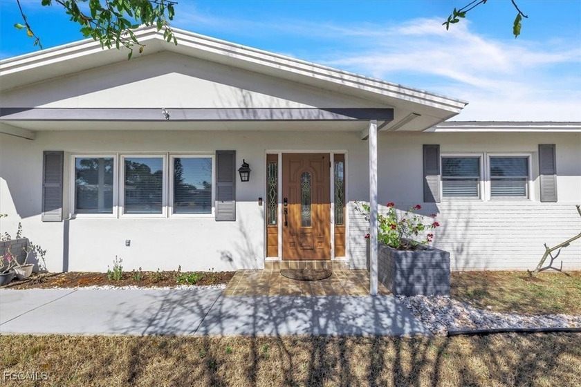 Stunning Remodeled Home in Lehigh Acres Welcome to this - Beach Home for sale in Lehigh Acres, Florida on Beachhouse.com
