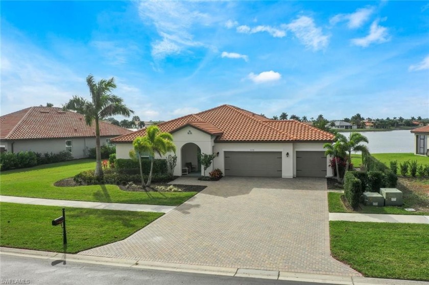 This inviting home boasts a spacious, open floor plan that's - Beach Home for sale in Naples, Florida on Beachhouse.com