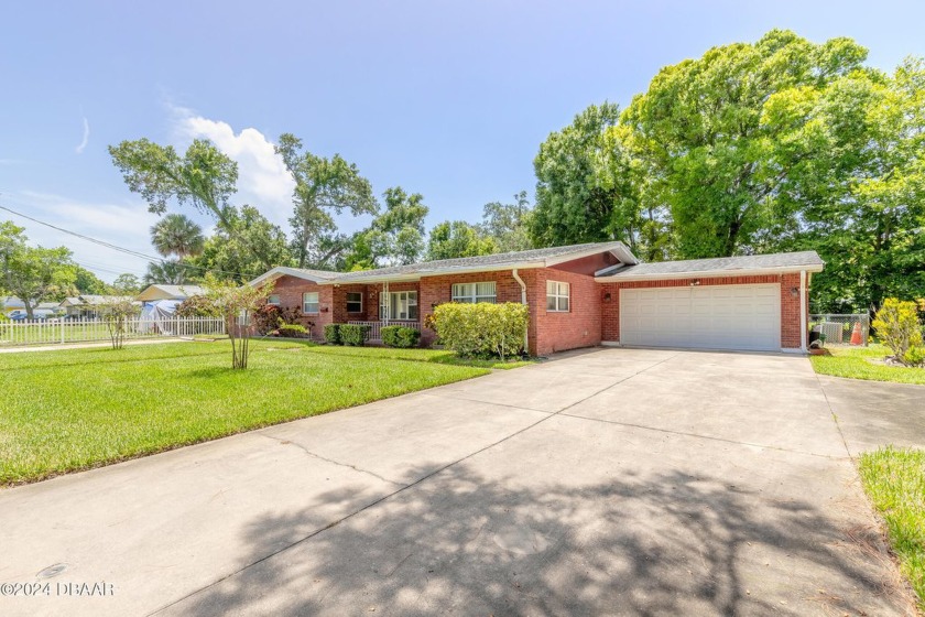 Introducing this impressive brick beauty, boasting over 3,000 - Beach Home for sale in Daytona Beach, Florida on Beachhouse.com