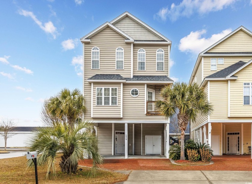 Welcome to this stunning raised beach home just a short walk or - Beach Home for sale in Surfside Beach, South Carolina on Beachhouse.com