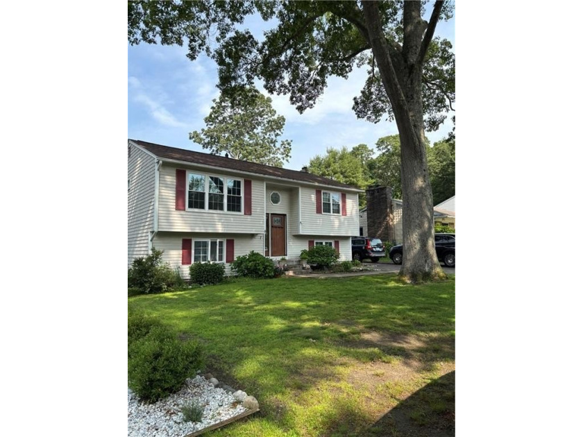 Located just one street over from the Narrow River in the heart - Beach Home for sale in Narragansett, Rhode Island on Beachhouse.com