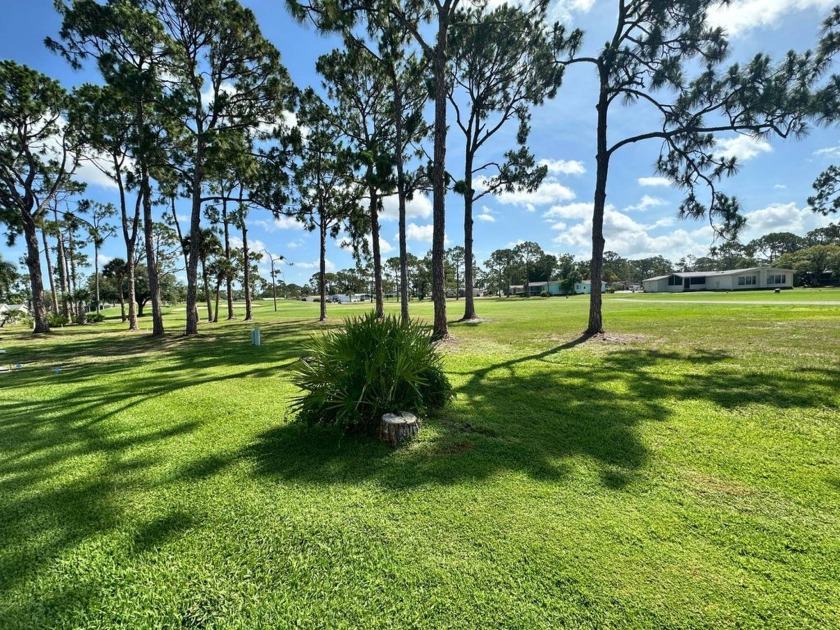 A beautiful remodeled home done in 2022! As you arrive at the - Beach Home for sale in North Fort Myers, Florida on Beachhouse.com