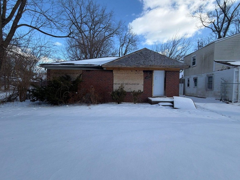 This one-story brick home with a full basement presents a clear - Beach Home for sale in Detroit, Michigan on Beachhouse.com