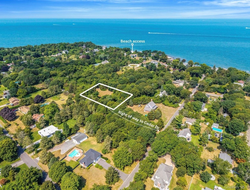 Discover the perfect canvas for your dream home at 702 Cedar - Beach Lot for sale in East Marion, New York on Beachhouse.com