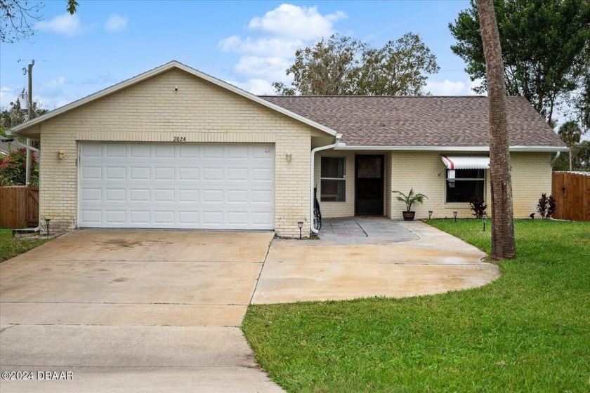 Welcome to this inviting home in the sought-after Florida Shores - Beach Home for sale in Edgewater, Florida on Beachhouse.com