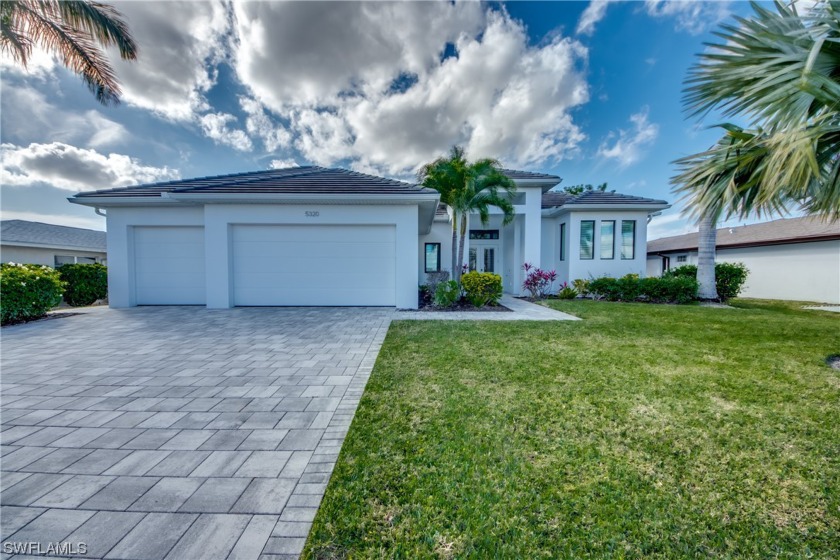 Elegant contemporary property with Direct Sailboat access and - Beach Home for sale in Cape Coral, Florida on Beachhouse.com