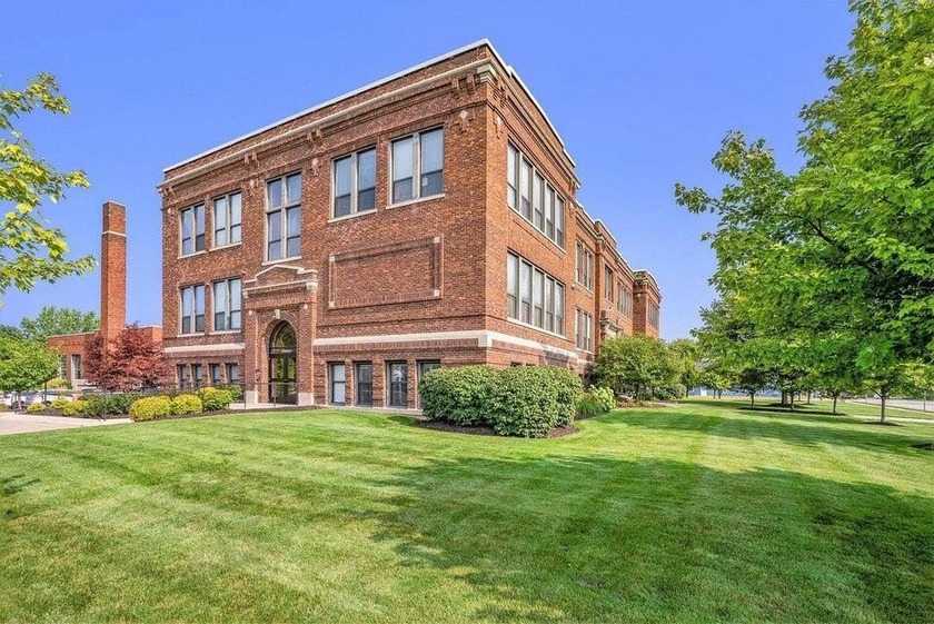 Loft Style Condo in the highly sought-after Central Lofts! This - Beach Condo for sale in South Haven, Michigan on Beachhouse.com