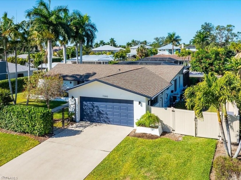 Live the ultimate Florida waterfront lifestyle in this - Beach Home for sale in Bonita Springs, Florida on Beachhouse.com