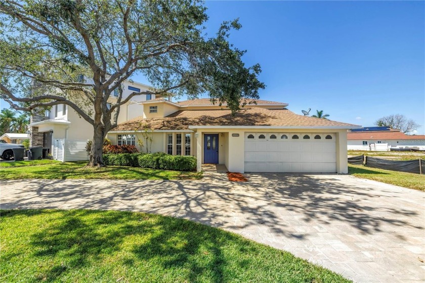 Welcome to your elegant coastal retreat -- a superbly updated - Beach Home for sale in Redington Shores, Florida on Beachhouse.com
