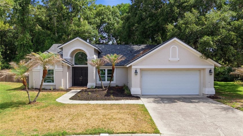 Tucked away on a quiet cul-de-sac in sought-after Tampa Palms - Beach Home for sale in Tampa, Florida on Beachhouse.com