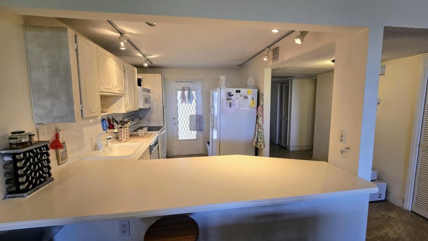 Enjoy serene lake views from this bright and spacious 3-bedroom - Beach Condo for sale in Pompano Beach, Florida on Beachhouse.com