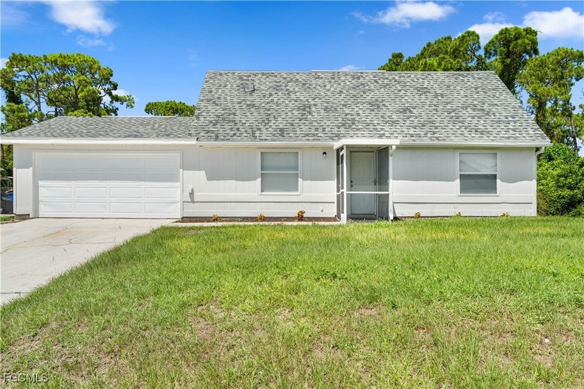 This beautifully updated home is located on a quiet and friendly - Beach Home for sale in Lehigh Acres, Florida on Beachhouse.com